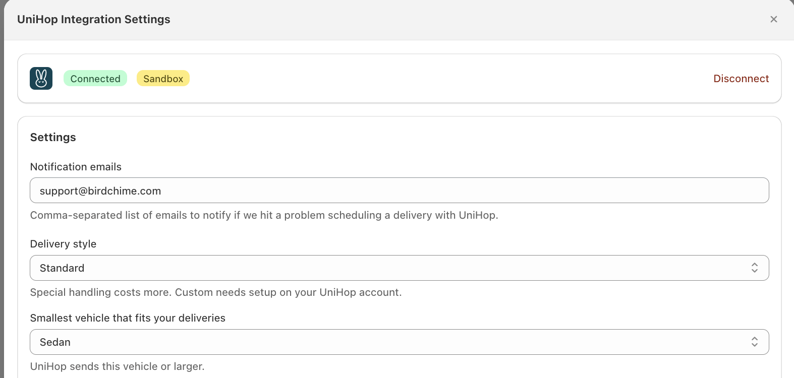 UniHop Integration Settings modal showing Notification emails, Delivery style, and Smallest vehicle fields