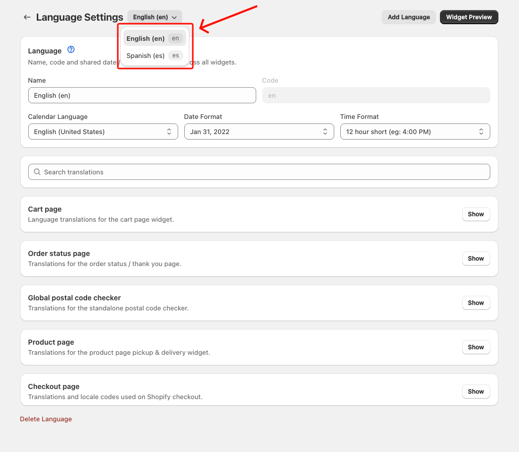 The language dropdown open, listing English (en) and Spanish (es) with their language codes